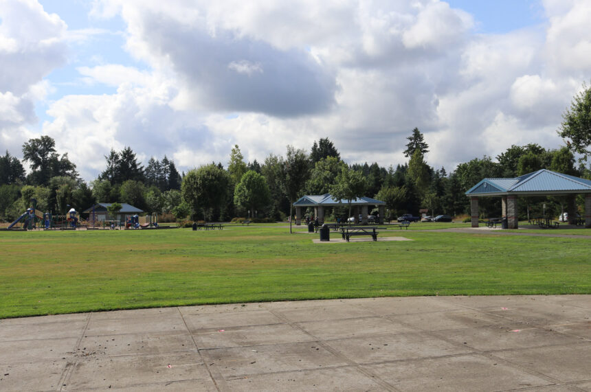 paved landing and park greens with many picnic shelters
