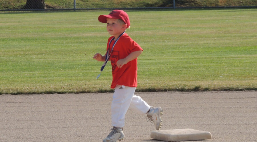 little kid running the bases